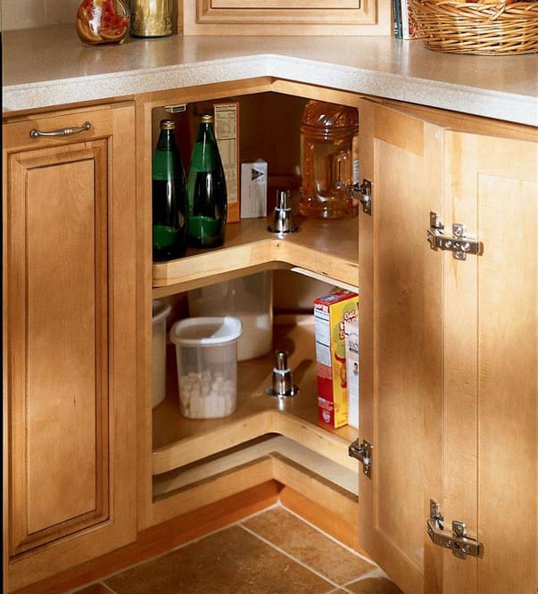 Corner base cabinet equipped with Lazy Susan for optimized storage in tight spaces