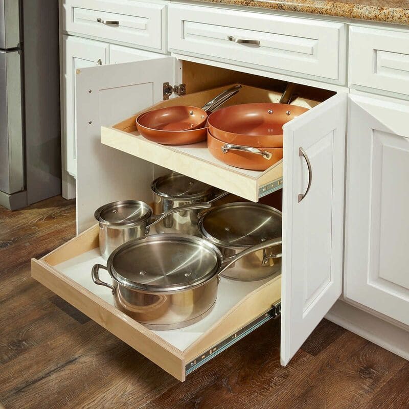 Custom cabinetry with pull-out shelves in a compact kitchen layout.