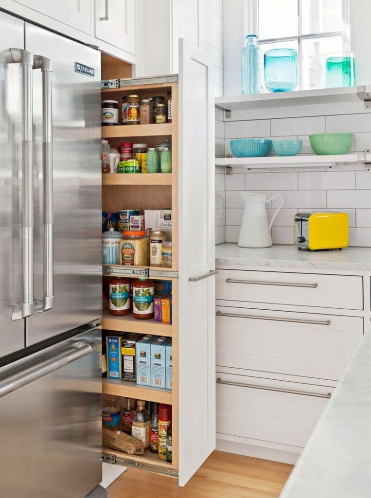 Modern kitchen cabinets with pull-out storage solutions.