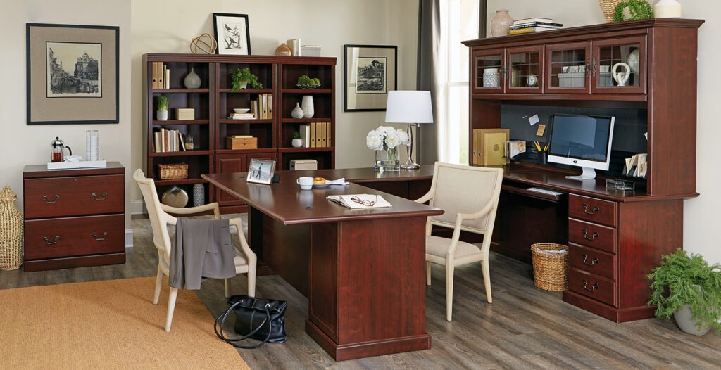 Sauder’s home office setup featuring ergonomic desks and shelving
