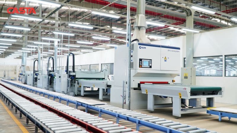 Factory floor showcasing the automated assembly line of manufactured cabinets